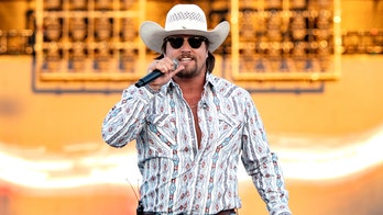 Country singer Gavin Adcock’s show erupts as fan storms stage, gets tackled