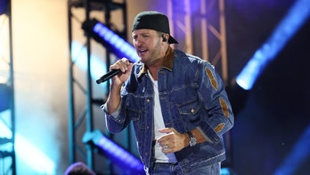 Luke Bryan blasts 'idiots' who throw things at singers after he was hit mid-performance
