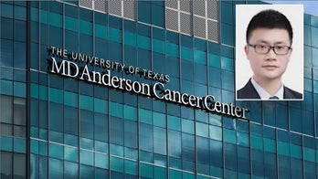 Chinese doctor accused of attempting to smuggle cancer research from US to China