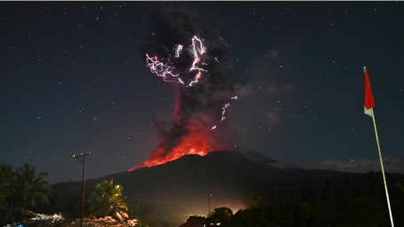 Stunning photos capture moment one of Indonesia's most active volcanoes erupts