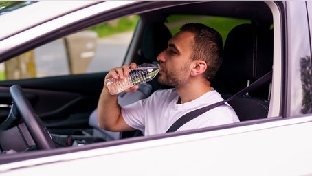 Plastic water bottle left in a hot car? Think twice before sipping from it