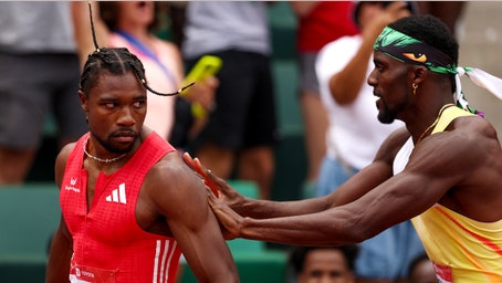 Noah Lyles shoved by rival Kenny Bednarek after 200M victory, sparks heated confrontation