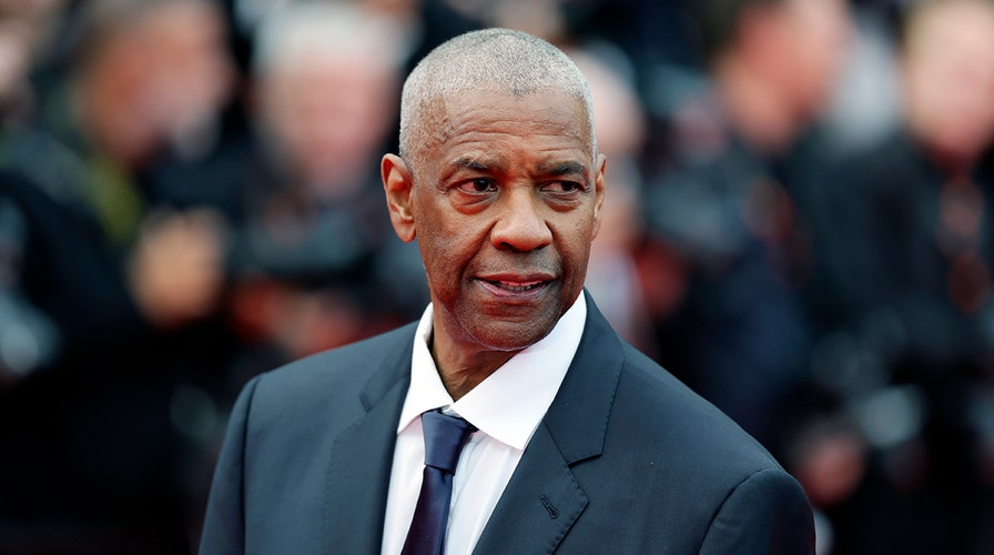 Denzel Washington erupts after photographer appears to grab him on Cannes red carpet