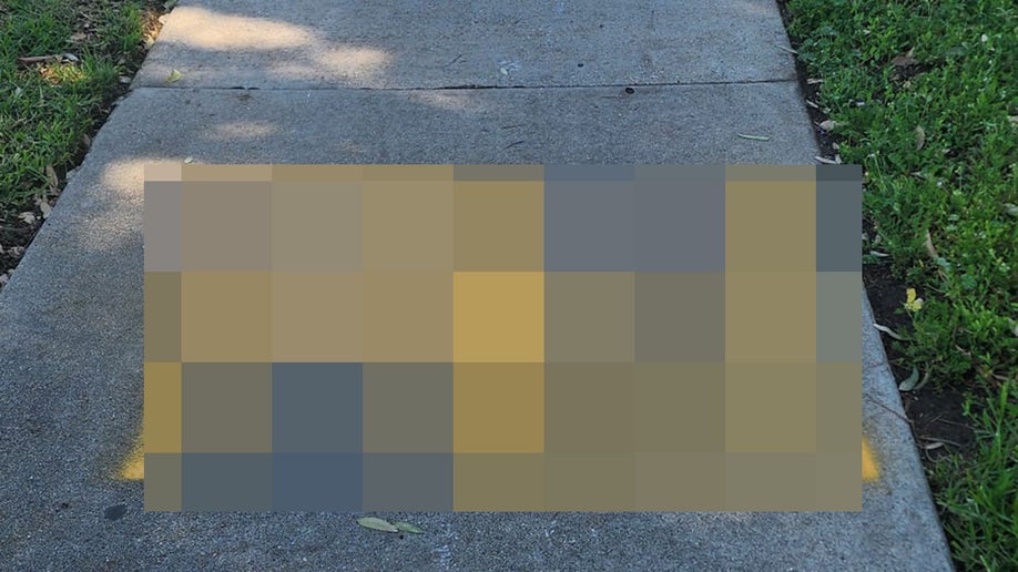 Blurred out view of street antisemitic graffiti