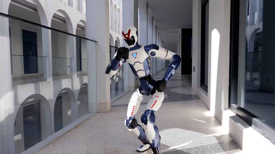 Humanoid robot turns heads at NYC sneaker store