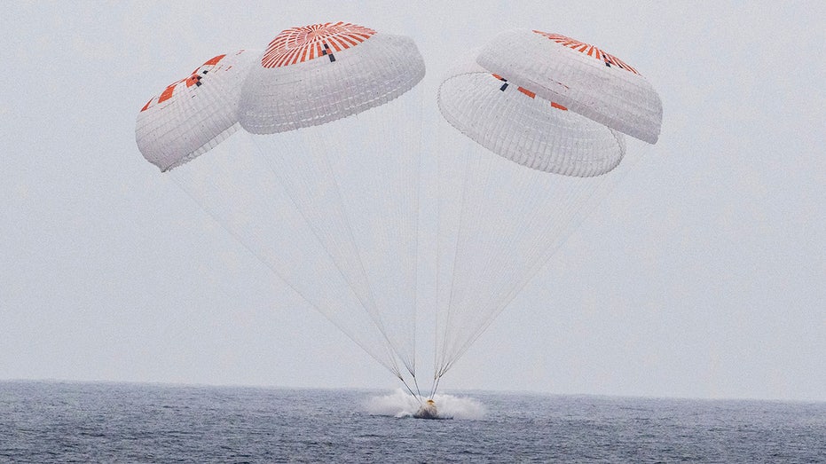 Astronauts splash down in Pacific after completing ISS mission that relieved stranded crew members