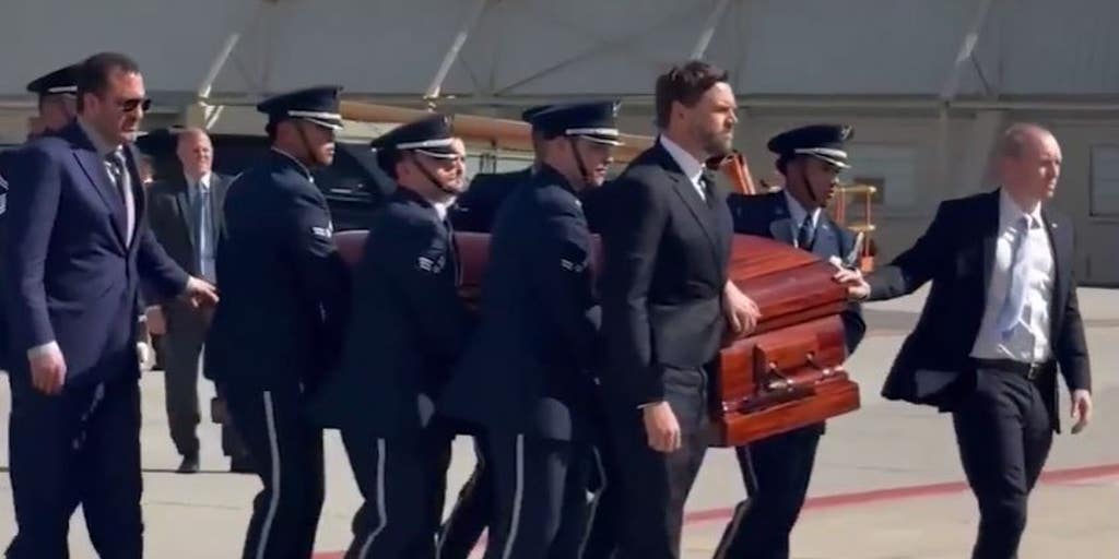 Vice President JD Vance escorts Charlie Kirk's casket before flight on Air  Force Two from Utah to Arizona