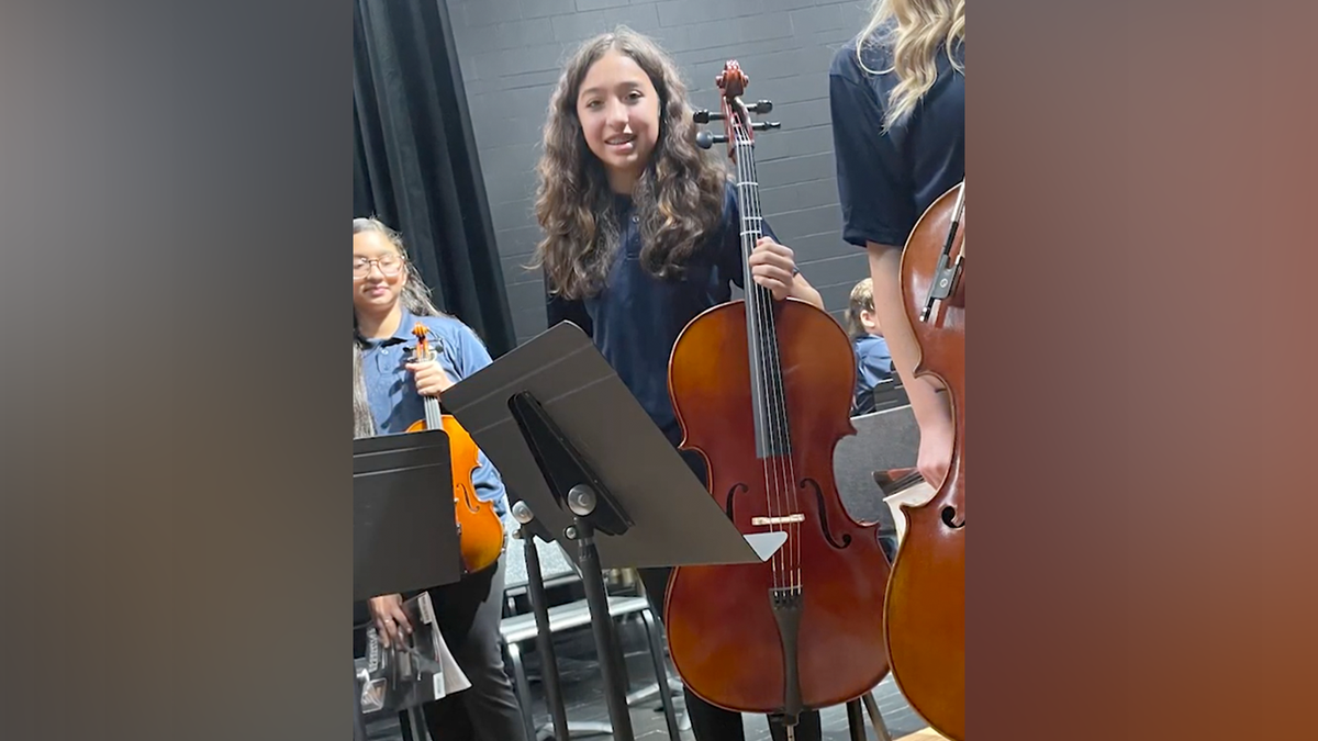Jocelyn Nungaray with musical instrument