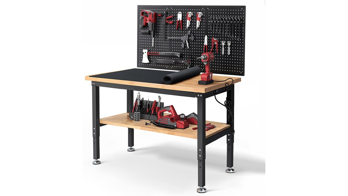 Stay organized with this work table, complete with a pegboard and cord organizer.