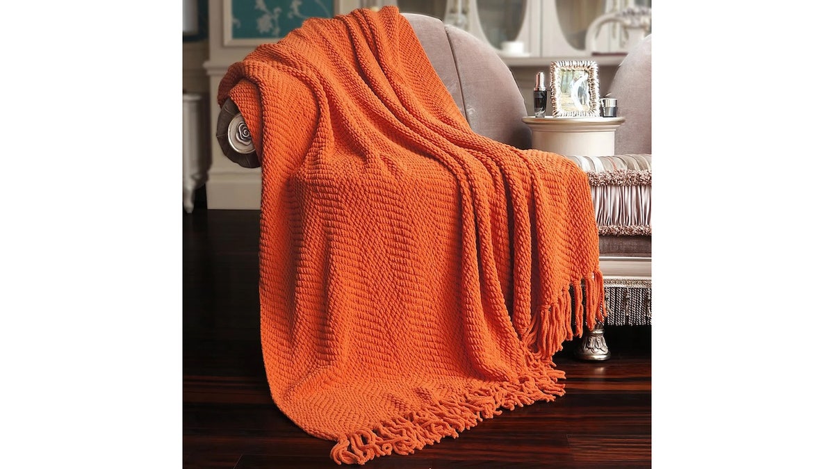 This blanket is perfect for creating a warm, inviting atmosphere.