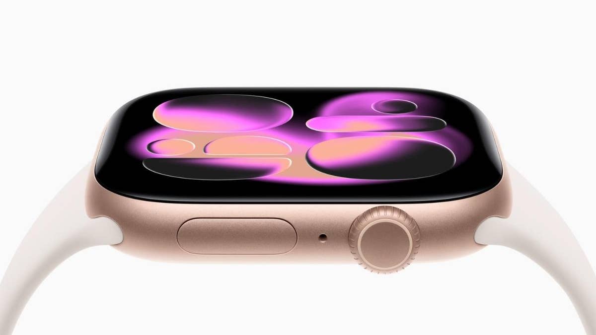 Apple Watch with pink and purple bubbles on the screen