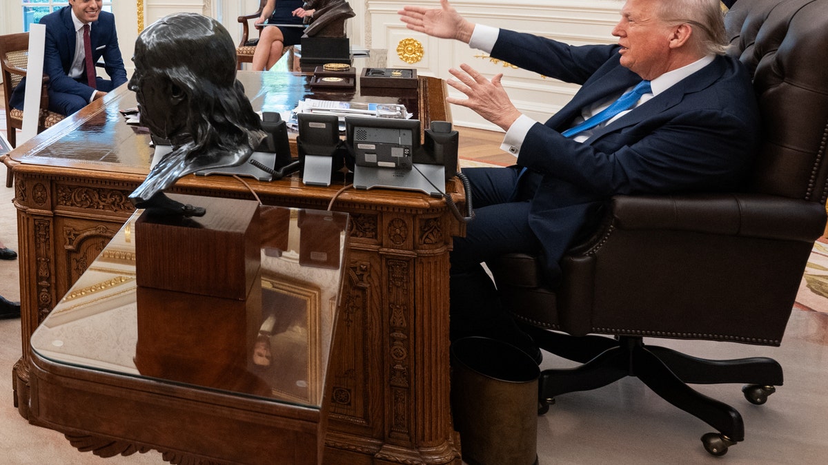 President Donald Trump meets with White House staff and America250 Executive Director Ariel Abergel, left, discussing the 250th Anniversary of the U.S. Army Grand Military Parade in the Oval Office, June 3, 2025. 