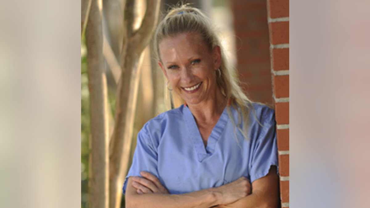 Julie Schnuelle smiles in the photo