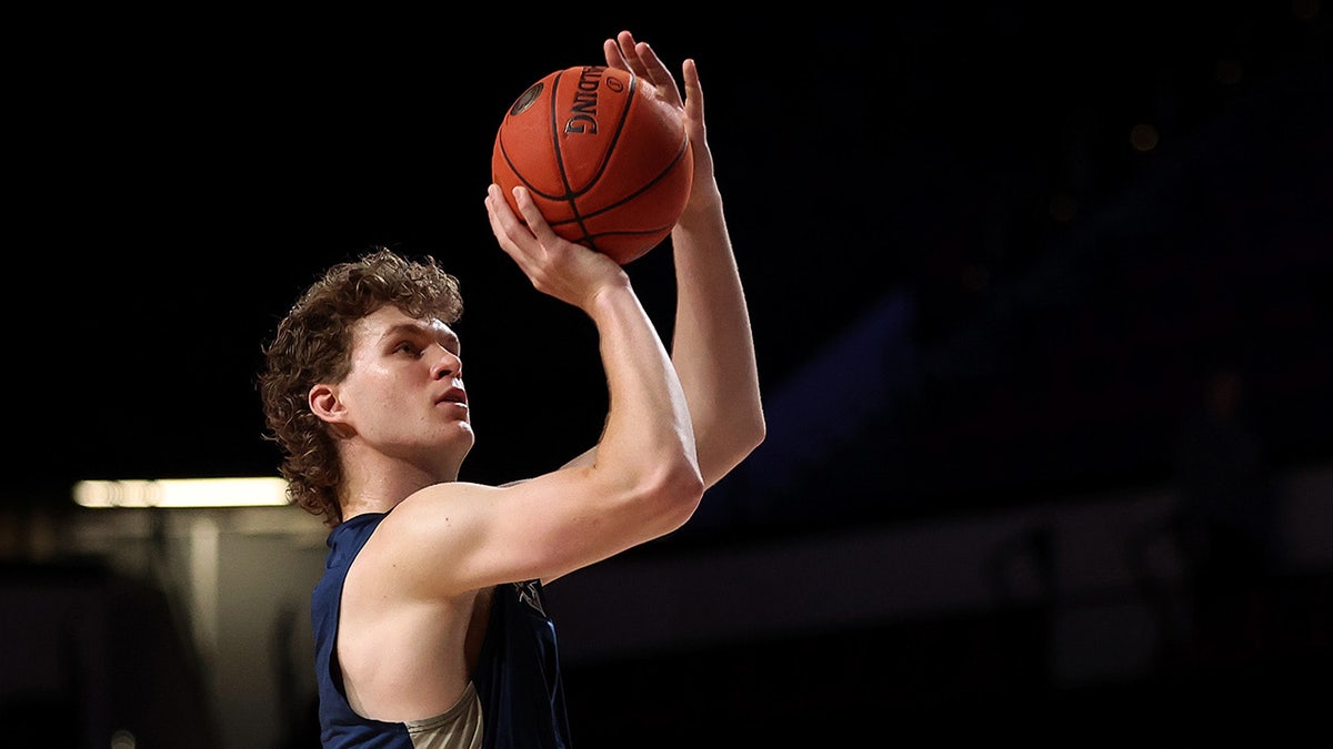Ben Griscti looks to shoot the basketball
