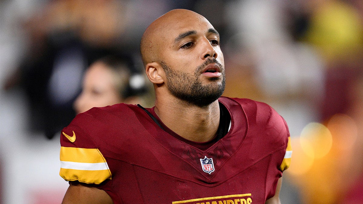 Austin Ekeler looks on