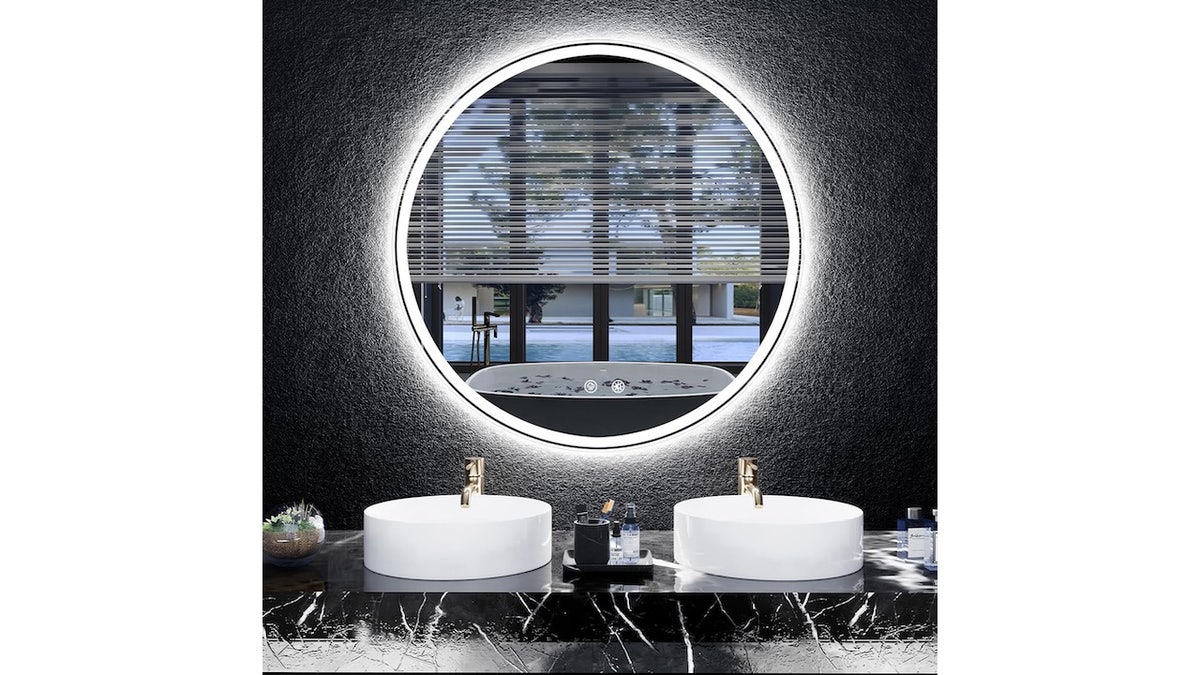 Add better lighting to your bathroom with an LED mirror. 