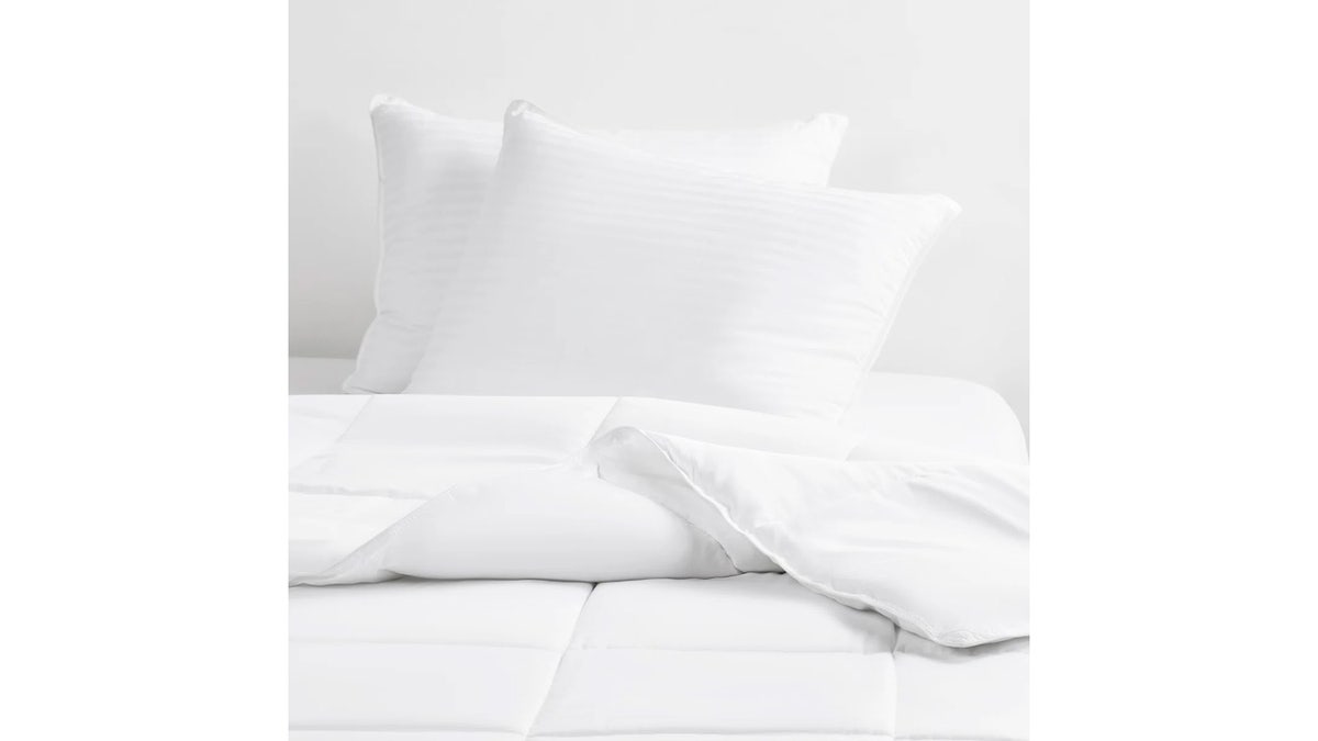 This two-piece pillow set delivers plush comfort with built-in cooling technology.