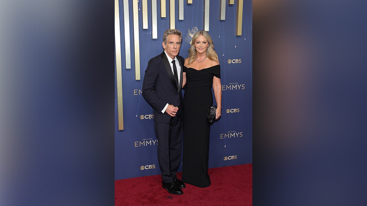 Ben Stiller and Christine Taylor posing for photos at the Emmy Awards in 2025.