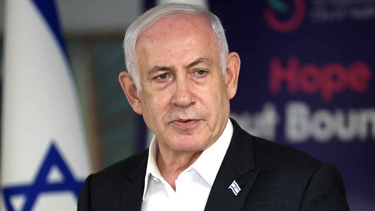 Israeli Prime Minister Benjamin speaking outside a medical center