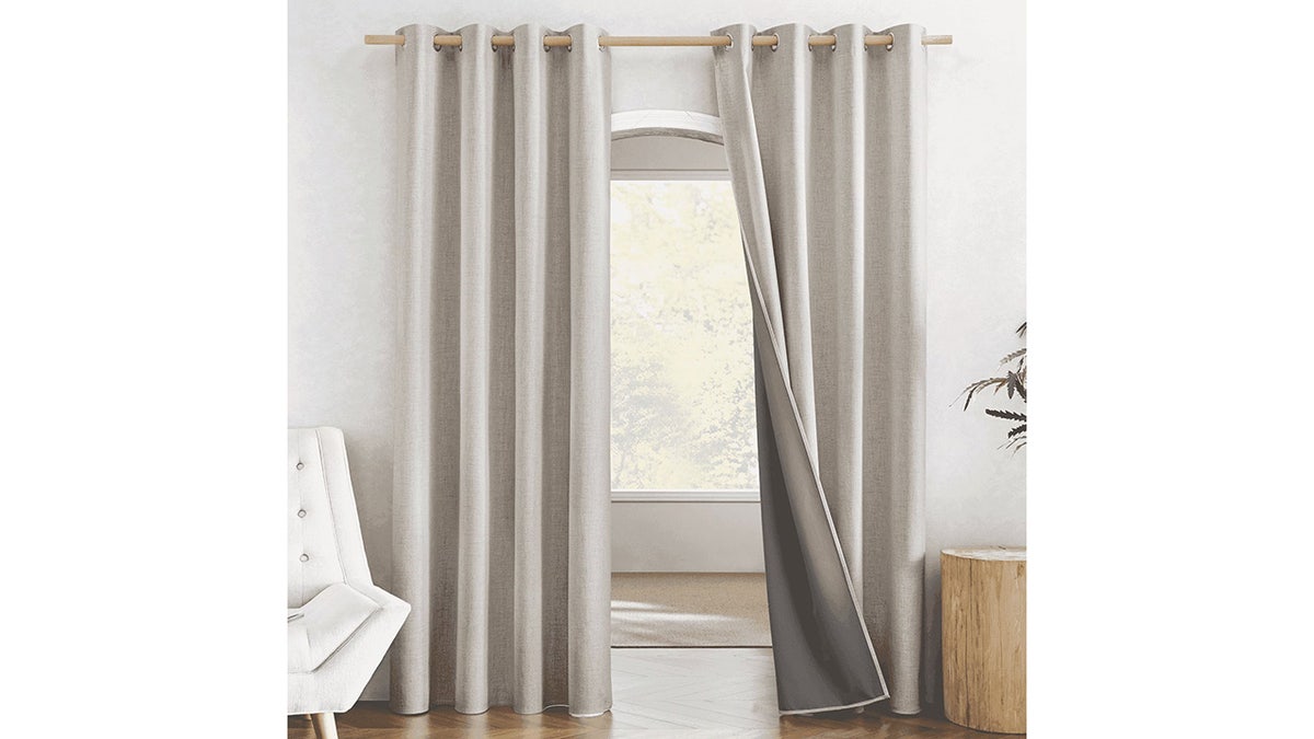 These blackout linen curtains create a dark and comfortable place to sleep.