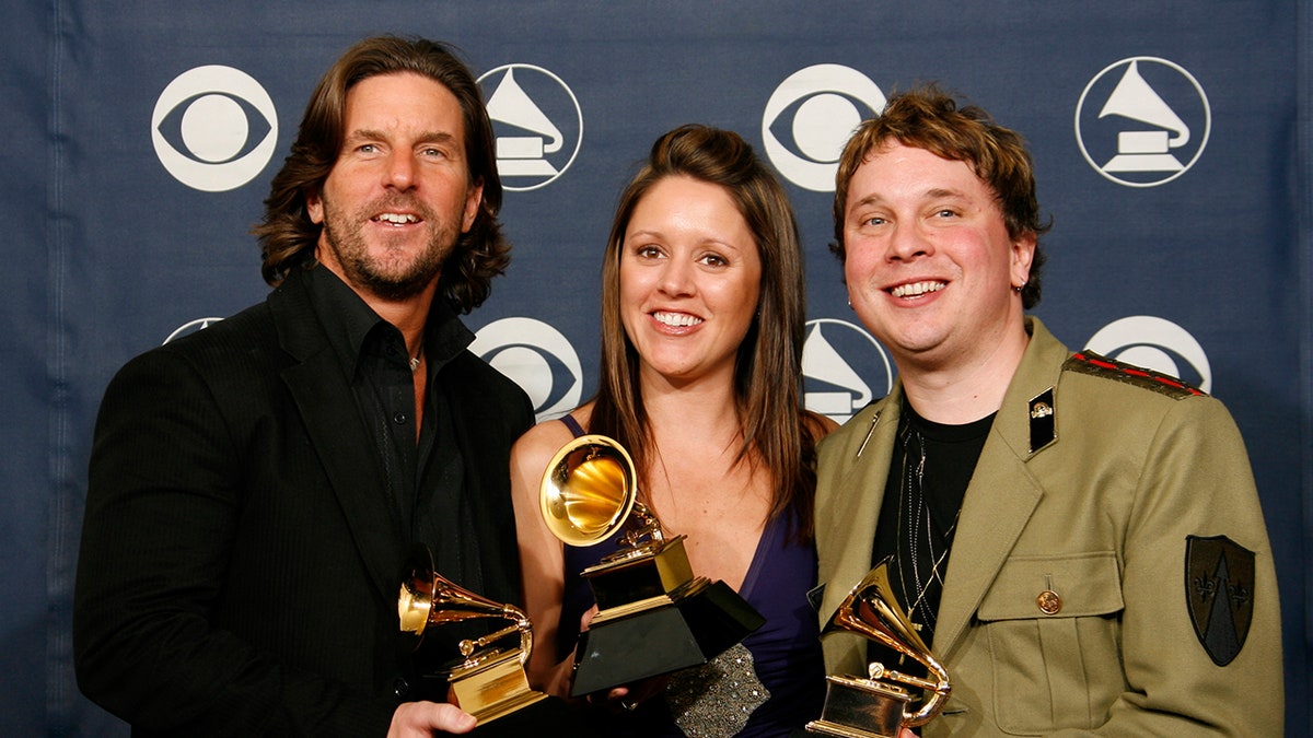 Brett James, Hillary Lindsey, and Gordie Sampson holding Grammy for Best Country Song, 2007