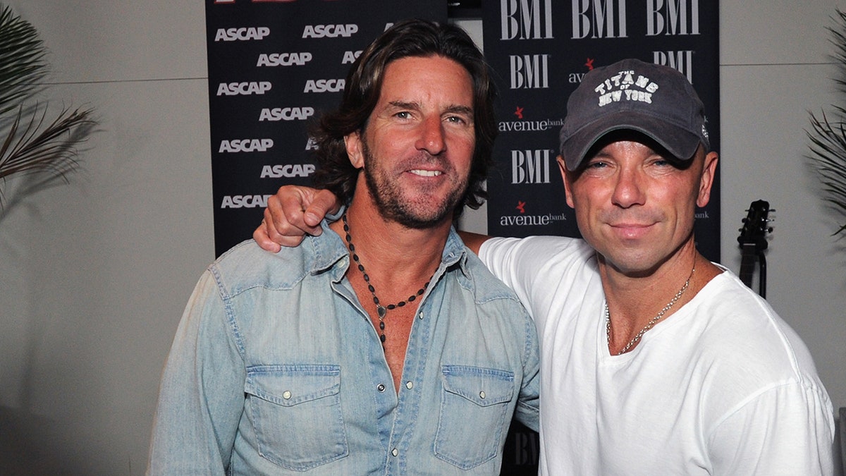 Brett James and Kenny Chesney celebrate their No. 1 single "Reality" at a BMI & ASCAP party in Nashville.