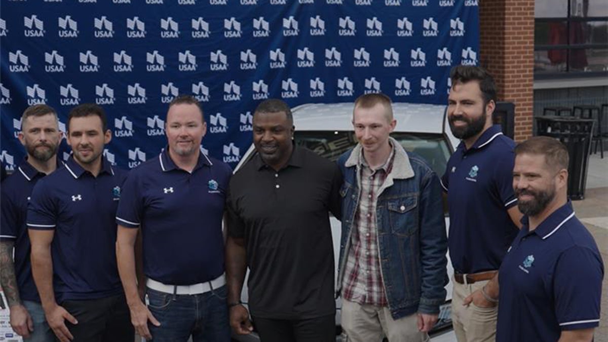 Brian Westbrook with military members