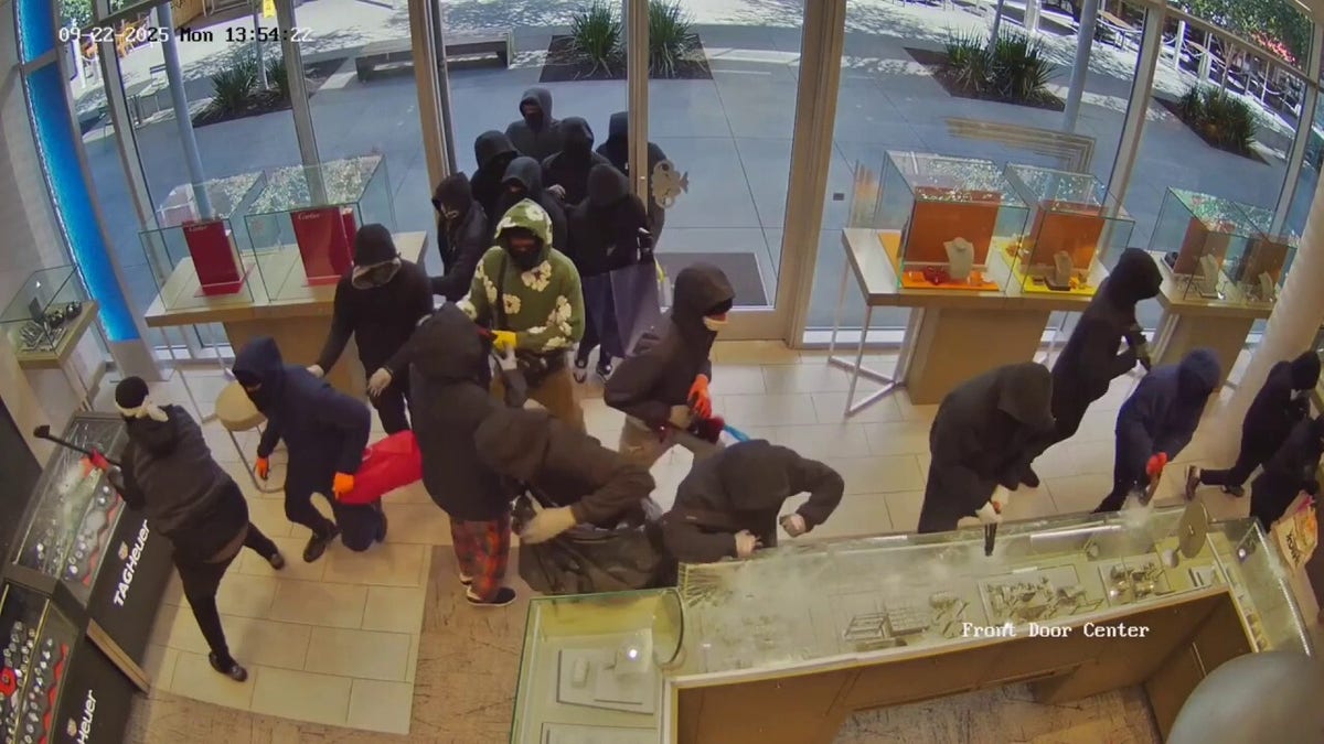 Video footage from a California jewelry store shows a smash-and-grab robbery.