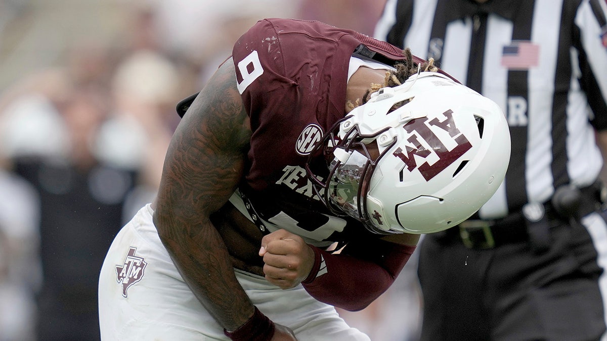 Cashius Howell reacts after sacking a quarterback
