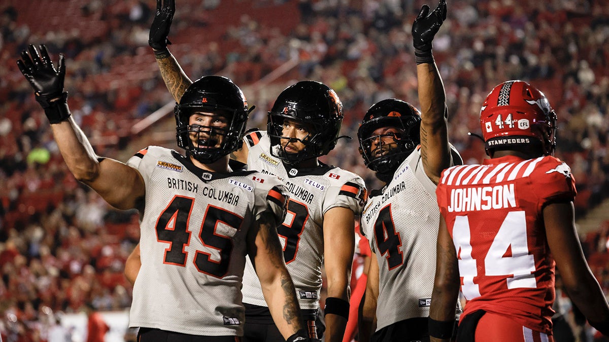 BC Lion Players Wave