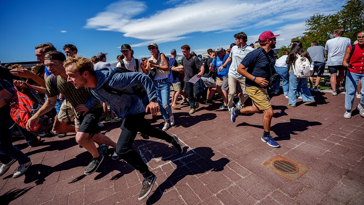 People run after Charlie Kirk
