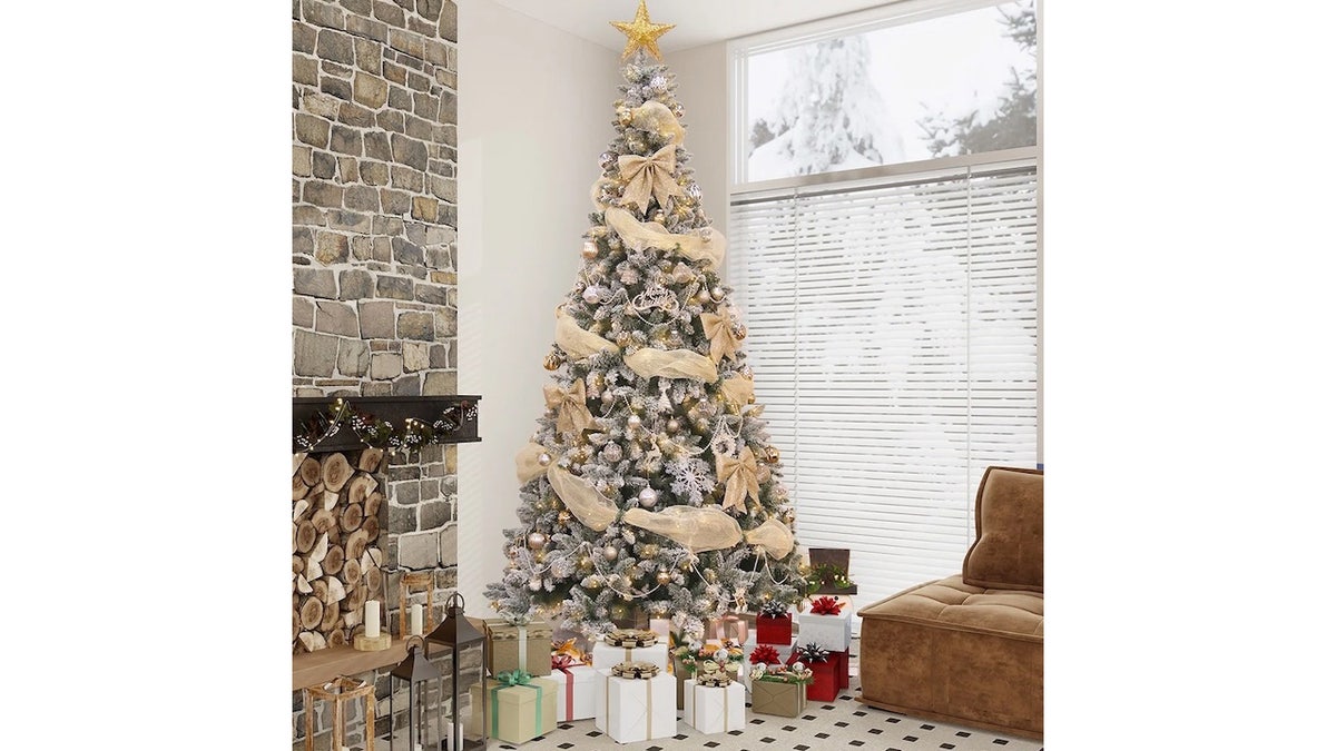 Embrace winter with this snow-covered tree.