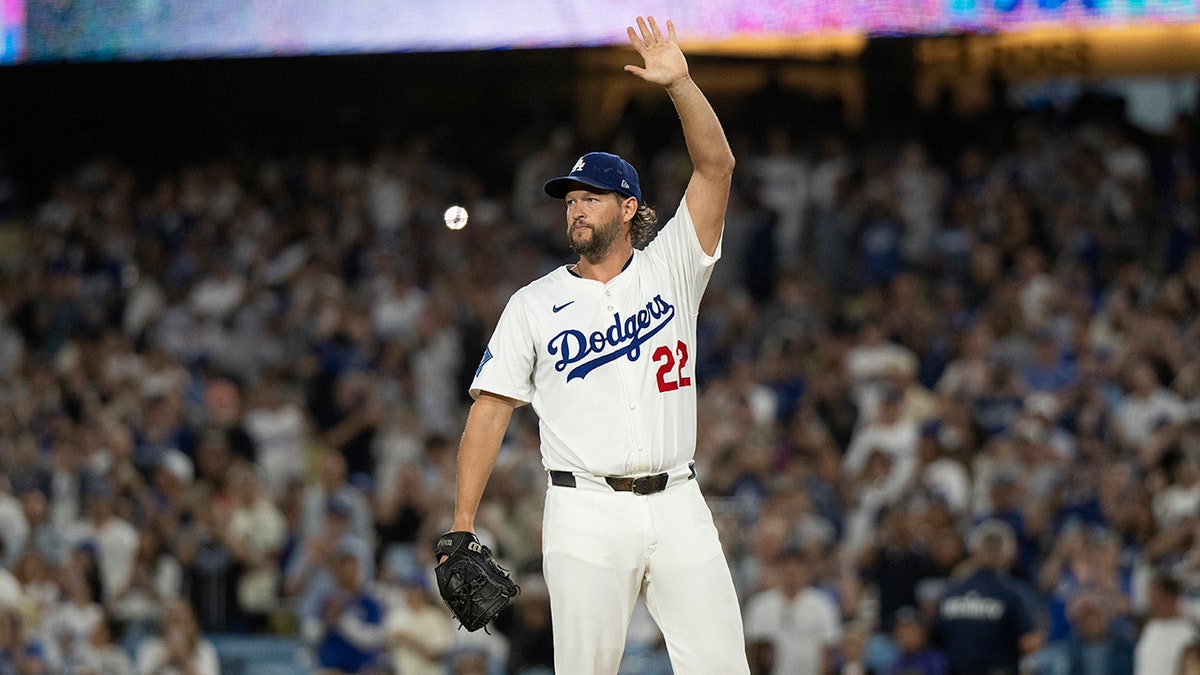 Clayton Kershaw salutes the crowd