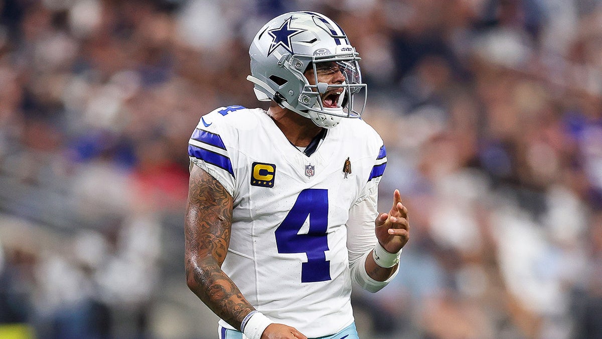 Dak Prescott celebrates on field