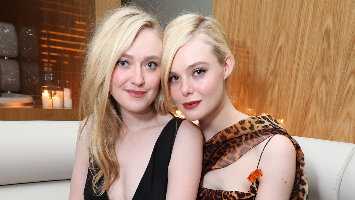 Dakota Fanning and sister Elle Fanning wear dresses