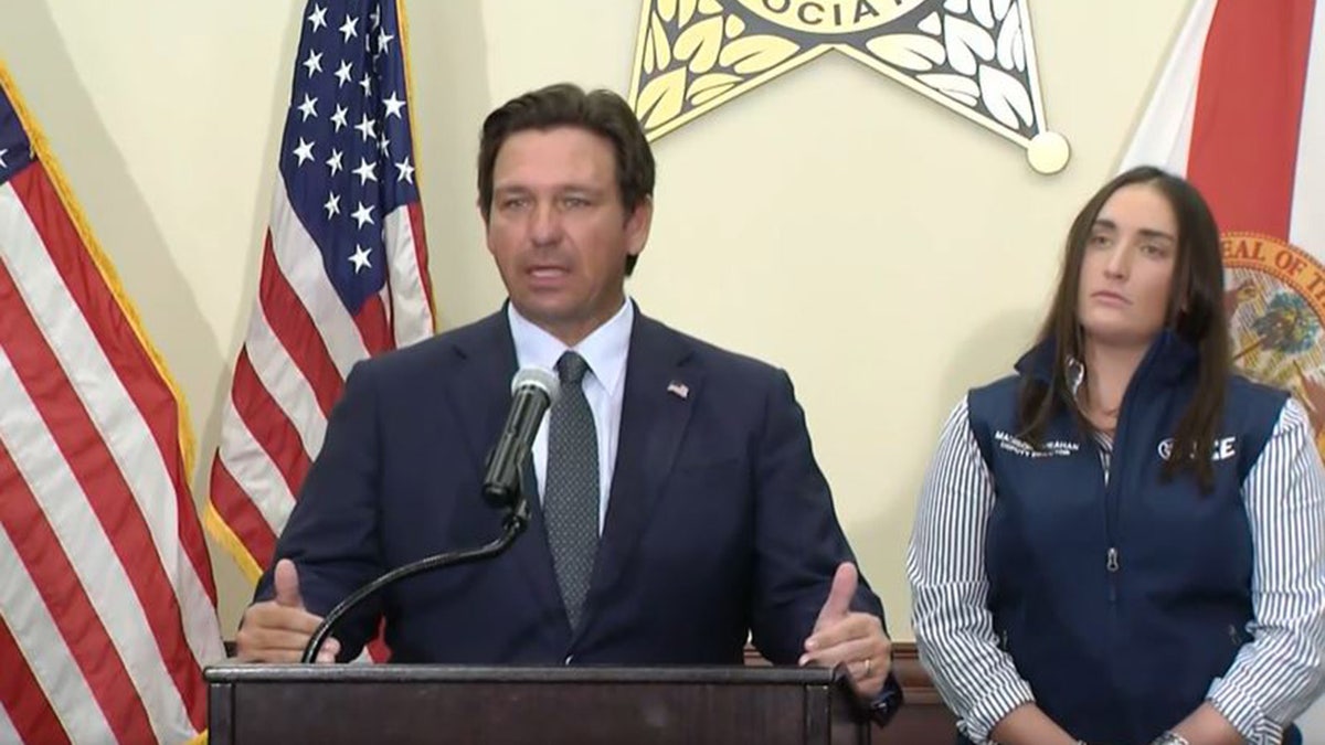 Florida Gov. Ron DeSantis and ICE Deputy Director Madison Sheahan during a news conference Friday, Sept. 26, 2025, in Tallahassee, Fla.