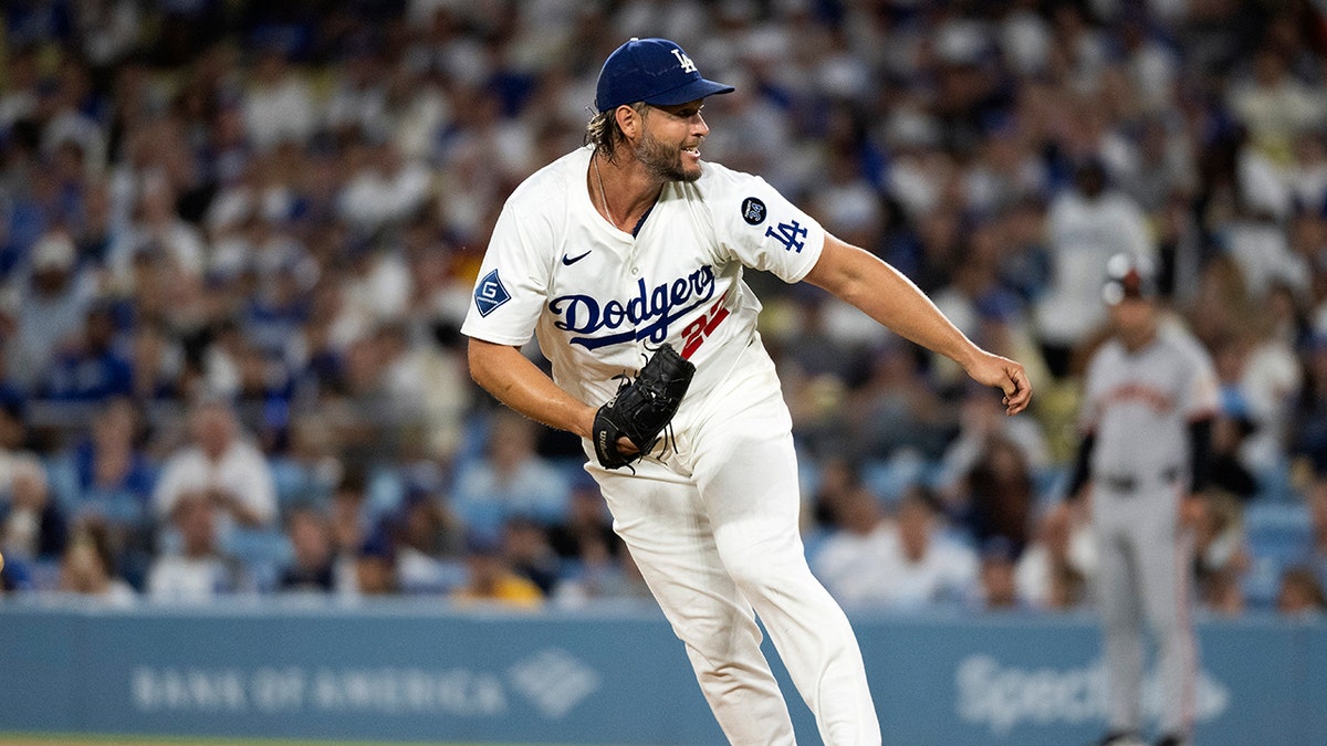Clayton Kershaw delivers a pitch