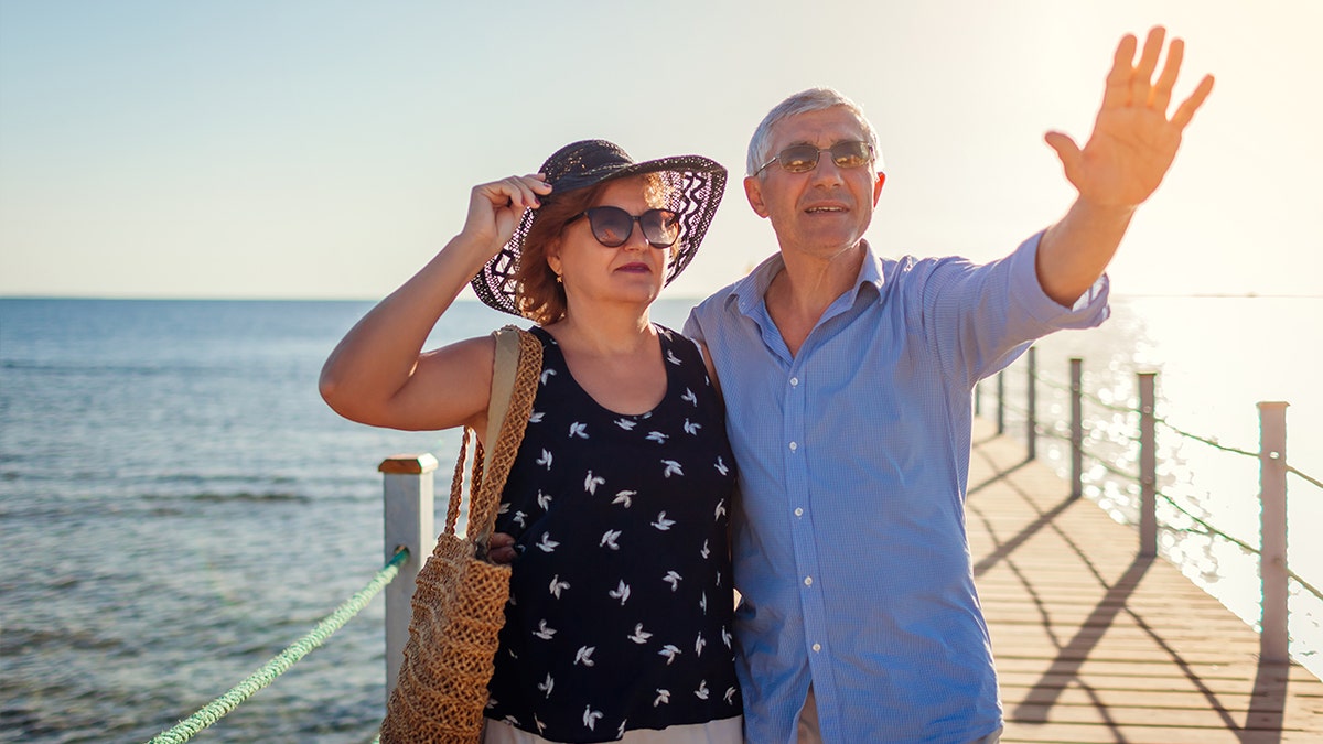 Egypt tourist couple looking at red sea