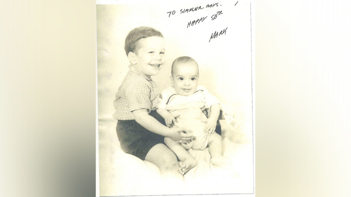 Jeffrey Epstein's family photo appears in his birthday book