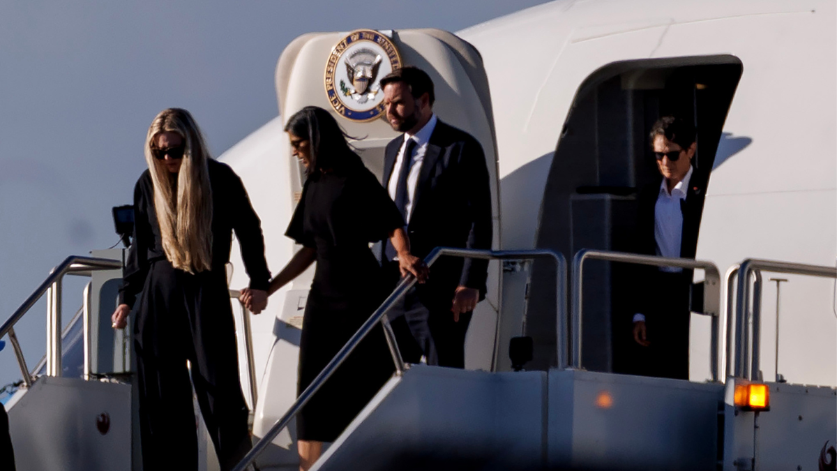 Second Lady Usha Vance holds Charlie Kirk's wife's hand
