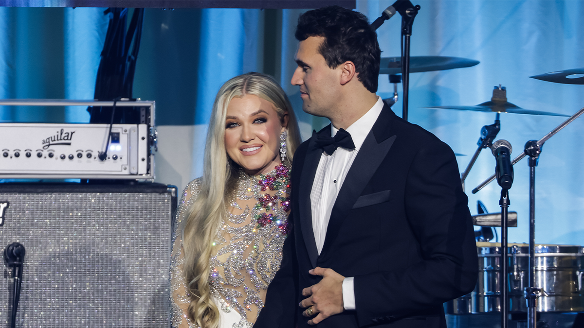Erika Kirk and her husband, Charlie Kirk, at TPUSA event