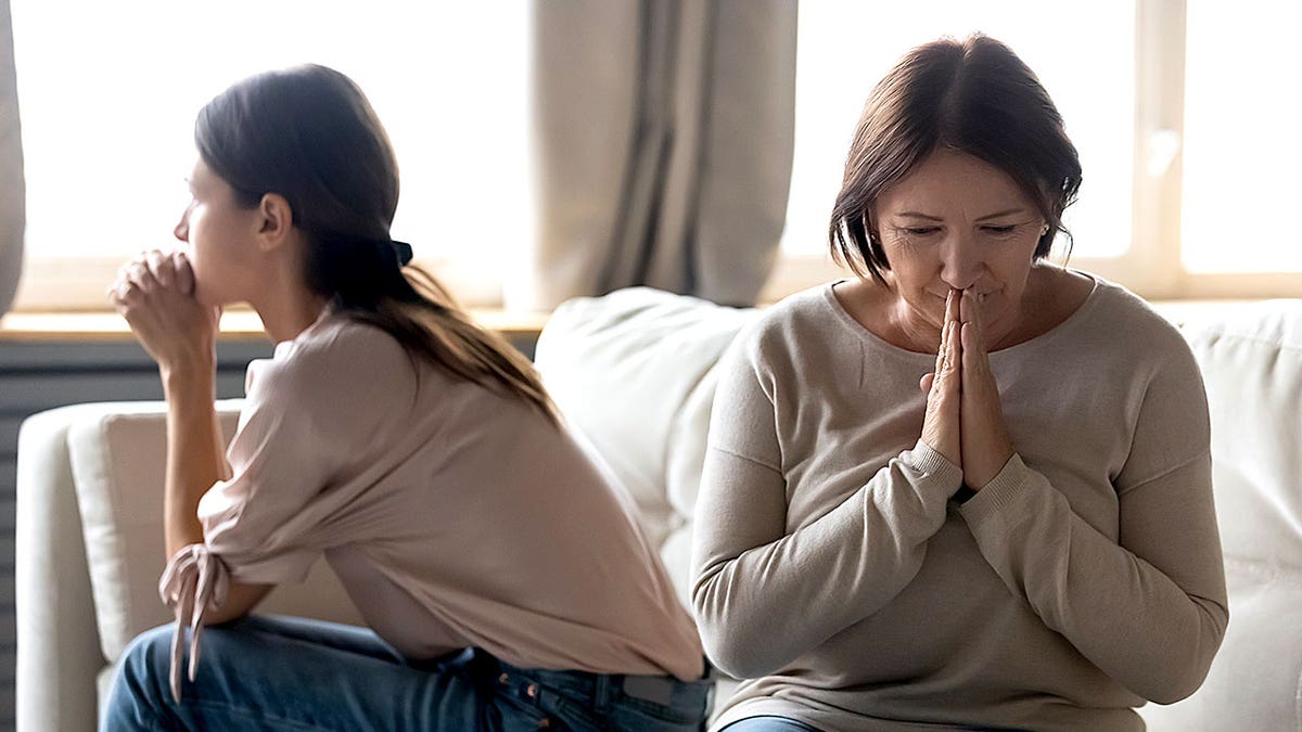 Mother and daughter face each other in battle