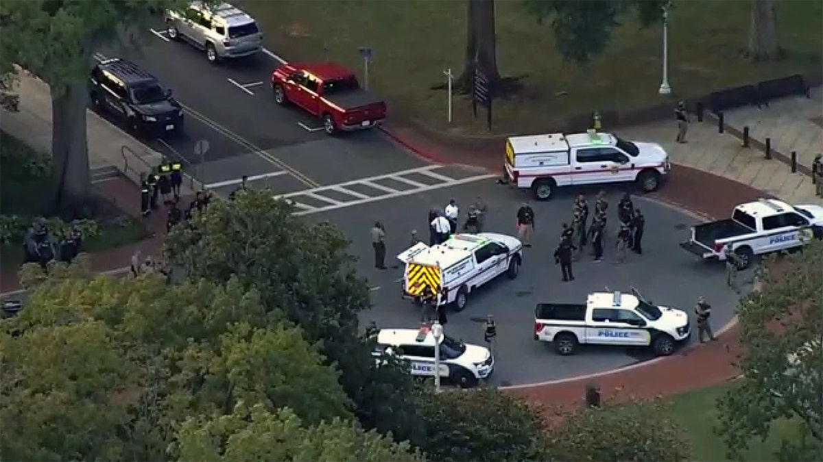 Police and first answers gather at the Navy Academy Campus in the middle of the locking