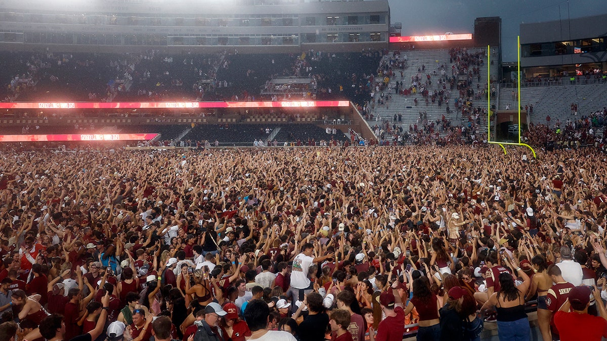 Florida State Seminoles fans storm the field