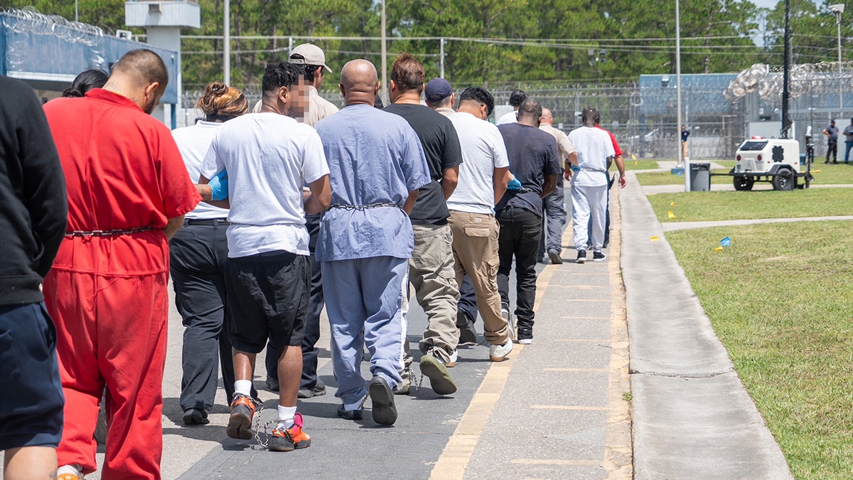 Migrants at Florida's Deportation Depot facility