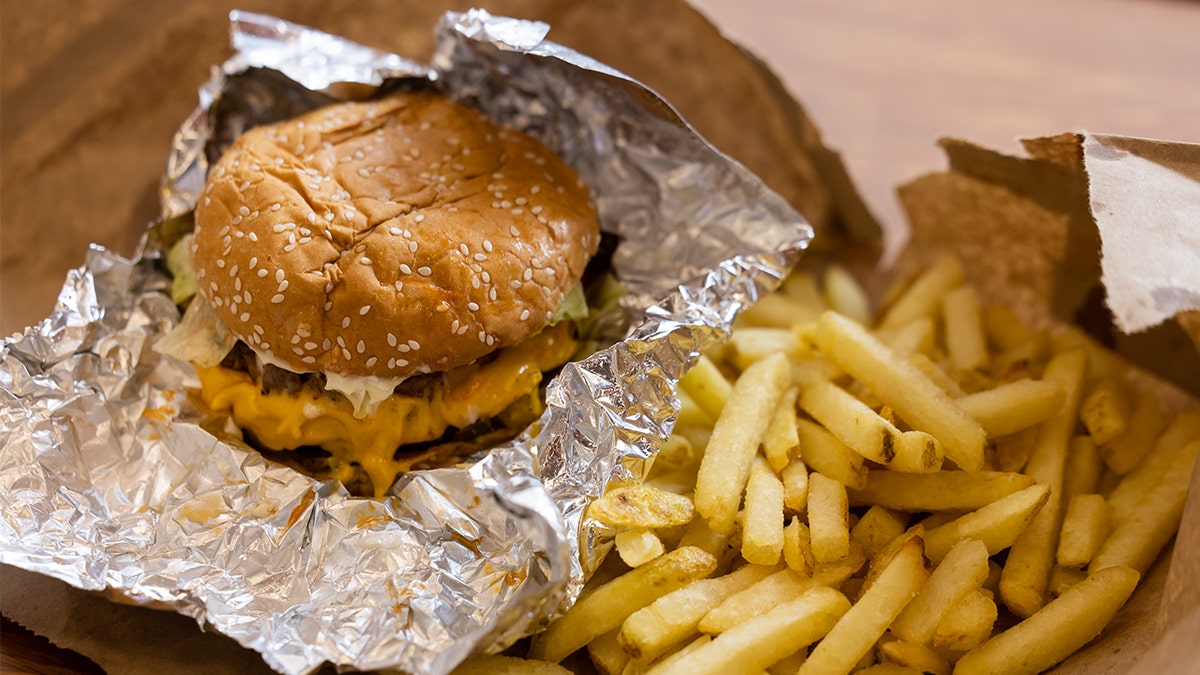 Five Guys burgers next to fries