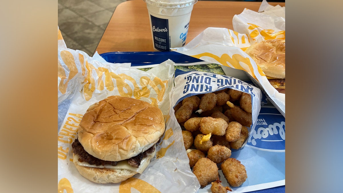 Culvers' butterburger next to cheese curds