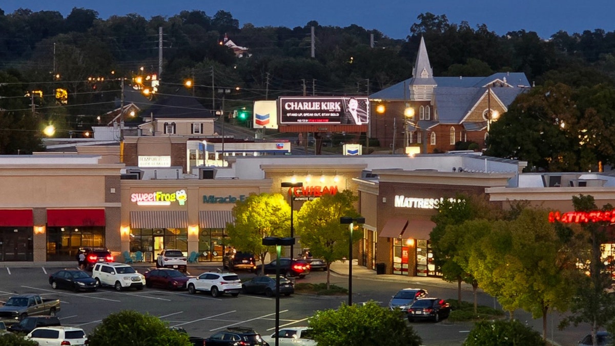 Landscape view of Charlie Kirk billboard