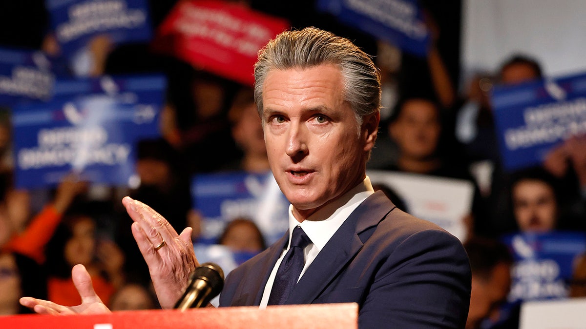 Gavin Newsom speaks before a crowd