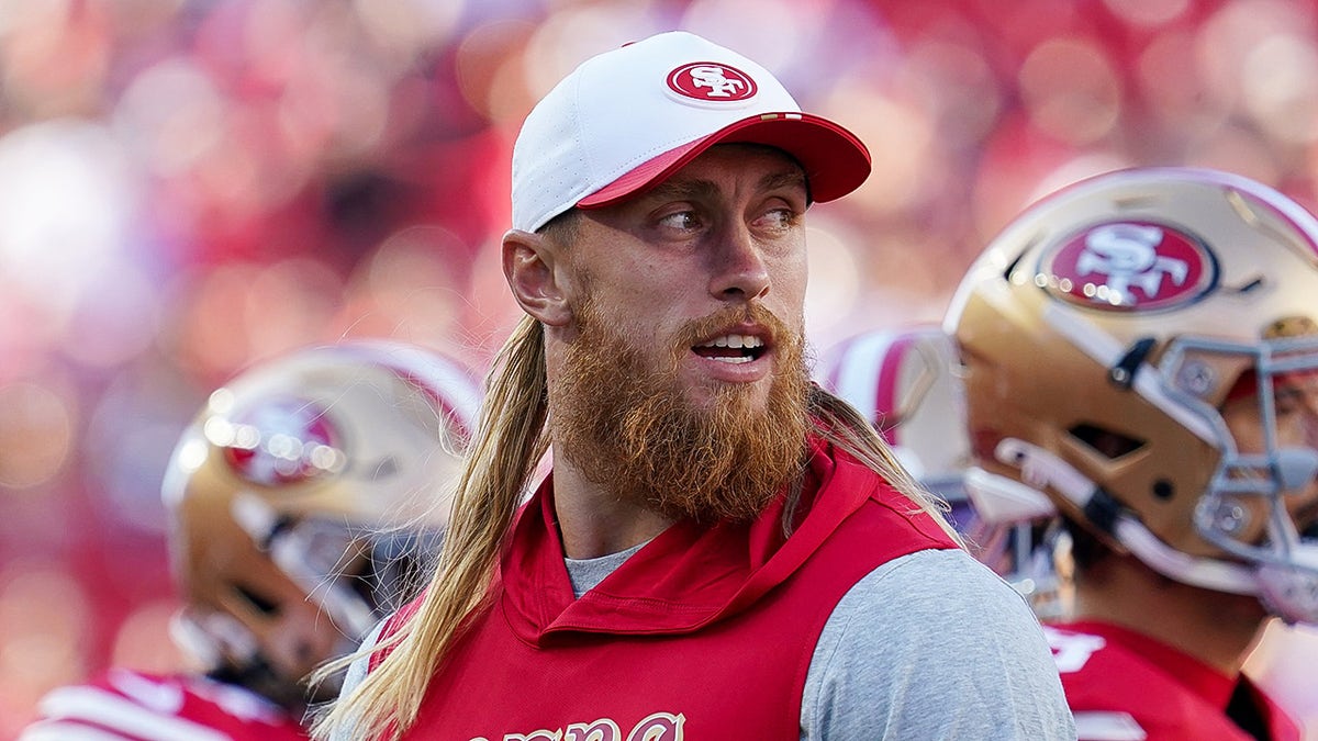 George Kittle looks on field